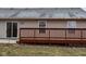 Outdoor back deck, adjacent to sliding glass door, with space for seating and entertaining at 7332 Jackie Ct, Indianapolis, IN 46221
