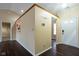Inviting foyer with dark hardwood floors and neutral paint leading into the home's open layout at 7332 Jackie Ct, Indianapolis, IN 46221
