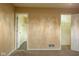 Hallway with carpet and views of bathroom with shower and closet at 7332 Jackie Ct, Indianapolis, IN 46221