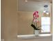 Close up on flowers in living room, with view of decorative lighting at 7332 Jackie Ct, Indianapolis, IN 46221