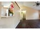 View of living room with hard wood floors, and decorative orchid at 7332 Jackie Ct, Indianapolis, IN 46221