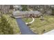Desirable neighborhood featuring ranch home, mature trees, and manicured lawns at 7481 Holliday E Dr, Indianapolis, IN 46260