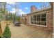Wide shot of a wooden deck with a wrought iron table and chairs and lush foliage at 7481 Holliday E Dr, Indianapolis, IN 46260