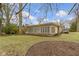 Beautiful sunroom with many windows for natural light and brick detail on this single Gathering home at 7481 Holliday E Dr, Indianapolis, IN 46260