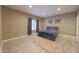 Comfortable bedroom featuring wood-look floors, a cozy bed, and a window with natural light, perfect for relaxation at 839 N Park Trail Dr, Carmel, IN 46032