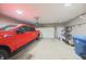 Spacious garage with a car and storage, offering ample room for vehicles and organization at 839 N Park Trail Dr, Carmel, IN 46032