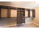 Custom walk-in closet with ample shelving, drawers, and hanging space for optimal organization and storage at 839 N Park Trail Dr, Carmel, IN 46032