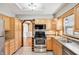 Well-appointed kitchen with abundant cabinetry and modern appliances, showcasing a functional layout at 9132 Log Run N Dr, Indianapolis, IN 46234