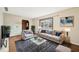 Comfortable living room with neutral tones and large window, creating a relaxing and inviting atmosphere at 9132 Log Run N Dr, Indianapolis, IN 46234