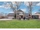 Spacious backyard featuring a patio, outdoor seating area, and a well-maintained lawn at 9132 Log Run N Dr, Indianapolis, IN 46234