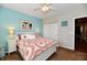 Bright bedroom with large closet, soft carpet, and modern accents at 9640 Clover Leaf Ln, Fishers, IN 46038