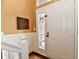 Charming entryway featuring hardwood floors and a decorative front door at 9640 Clover Leaf Ln, Fishers, IN 46038