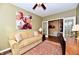 Cozy living room featuring a couch and French doors at 9640 Clover Leaf Ln, Fishers, IN 46038