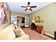 Comfortable living room with ceiling fan and natural light at 9640 Clover Leaf Ln, Fishers, IN 46038