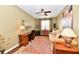 Cozy living room featuring a ceiling fan and a comfortable seating area at 9640 Clover Leaf Ln, Fishers, IN 46038
