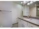 Bathroom features modern fixtures, gray stone countertop, and ample lighting at 110 E Washington St # 1102, Indianapolis, IN 46204