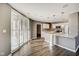 Open concept kitchen with stainless steel appliances, granite countertops, and a breakfast bar at 110 E Washington St # 1102, Indianapolis, IN 46204