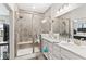 Beautiful bathroom featuring a glass-enclosed tiled shower and a double sink vanity with granite countertop at 11758 Harvester S Cir, Noblesville, IN 46060