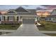 Charming home with a two-car garage and well-maintained lawn at 11758 Harvester S Cir, Noblesville, IN 46060