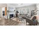 Cozy living room with a fireplace and elegant furnishings at 11758 Harvester S Cir, Noblesville, IN 46060