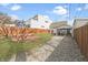 Spacious backyard with a brick firepit area, providing a cozy outdoor gathering space at 1210 S State Ave, Indianapolis, IN 46203