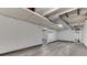 Finished basement area with sleek wood-look flooring offers a versatile space at 1210 S State Ave, Indianapolis, IN 46203