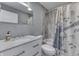 Well-maintained bathroom with a combination tub and shower, modern fixtures, and a neutral color palette at 1210 S State Ave, Indianapolis, IN 46203