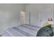 Bedroom interior showcasing a doorway to another room at 1210 S State Ave, Indianapolis, IN 46203