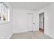 A view of a bedroom with carpet, baseboard heat and a closet at 1254 Mcdougal St, Indianapolis, IN 46203