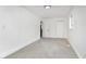A well lit bedroom with soft neutral carpet and a double door closet at 1254 Mcdougal St, Indianapolis, IN 46203