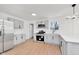 A bright kitchen features gray cabinets, stainless steel appliances, and plenty of counter space at 1254 Mcdougal St, Indianapolis, IN 46203