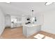Bright, airy kitchen with stainless steel appliances, modern lighting, and a sleek island at 1254 Mcdougal St, Indianapolis, IN 46203