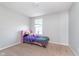 Bedroom featuring a bed, window, and neutral carpet at 12777 Rotterdam Rd, Fishers, IN 46037