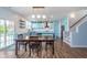 Bright dining area seamlessly connected to a modern kitchen, perfect for entertaining and gatherings at 12777 Rotterdam Rd, Fishers, IN 46037