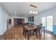 Open-concept living room and dining area with natural light and sleek modern finishes at 12777 Rotterdam Rd, Fishers, IN 46037