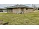 Brick home featuring a well maintained lawn and updated exterior at 1408 Lawrence Way, Anderson, IN 46013