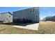 The backyard features a deck, a paved patio, and an ample amount of yard space at 15408 Brown Jack Dr, Fishers, IN 46040
