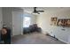 Bedroom featuring carpet, ceiling fan, a window with blinds, and a desk at 15408 Brown Jack Dr, Fishers, IN 46040