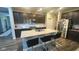 Spacious kitchen featuring stainless steel appliances, granite counters, and a center island with bar seating at 15408 Brown Jack Dr, Fishers, IN 46040