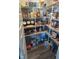 Walk-in pantry featuring ample shelving for organized storage of food and supplies at 15408 Brown Jack Dr, Fishers, IN 46040