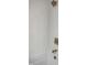 Elegant tub and shower area featuring stylish tile work and sleek bronze fixtures at 1668 Carrollton Rail Dr, Westfield, IN 46074