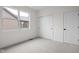 Neutral bedroom featuring natural light, light gray carpet and a closet at 1668 Carrollton Rail Dr, Westfield, IN 46074
