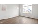 Bright, minimalist bedroom with large windows providing plenty of natural light at 1668 Carrollton Rail Dr, Westfield, IN 46074