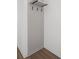 Neutral entryway with board and batten accent wall, hooks, shelf, and hardwood flooring at 1668 Carrollton Rail Dr, Westfield, IN 46074