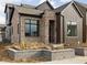 Striking new construction home with a unique brick and vertical siding exterior at 1668 Carrollton Rail Dr, Westfield, IN 46074