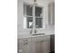 Kitchen featuring a stainless steel sink with grey cabinets and quartz countertops at 1668 Carrollton Rail Dr, Westfield, IN 46074