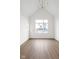 Bright, airy living room with hardwood floors and large windows providing ample natural light at 1668 Carrollton Rail Dr, Westfield, IN 46074