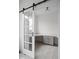 Office featuring a sliding glass door, built-in desk, cabinet, quartz counters, and carpet flooring at 1668 Carrollton Rail Dr, Westfield, IN 46074