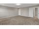 A carpeted bedroom includes two closets and one door at 1704 Beach St, Greenwood, IN 46143