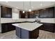 Spacious kitchen with dark cabinets and modern appliances at 1704 Beach St, Greenwood, IN 46143